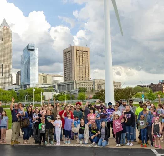 OHDELA students and families gathered for a group photo on a city outing